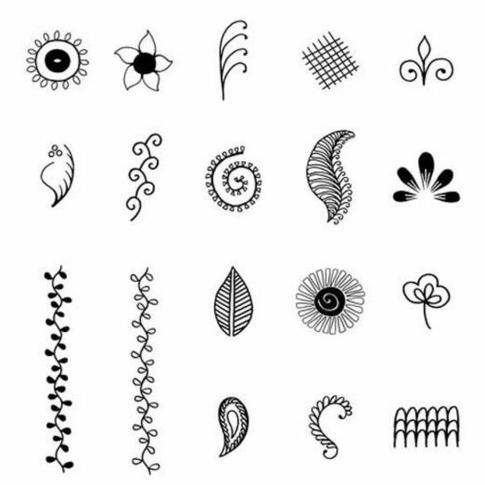 Χτένι μοτίβο τατουάζ - διάφορα σχήματα, λουλούδια, φύλλα φυτών, φτερό, μαύρο χρώμα