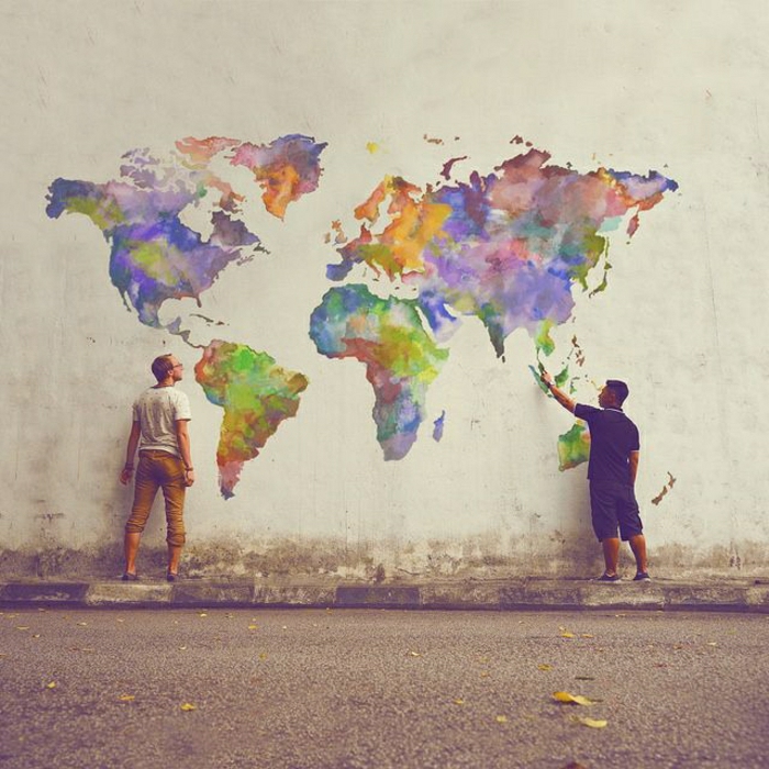 صور بناء جدار الكتابة على الجدران خريطة العالم القارات الرسومات الملونة الرجال