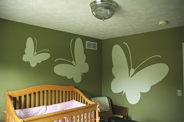 Mariposa color de la pared verdes