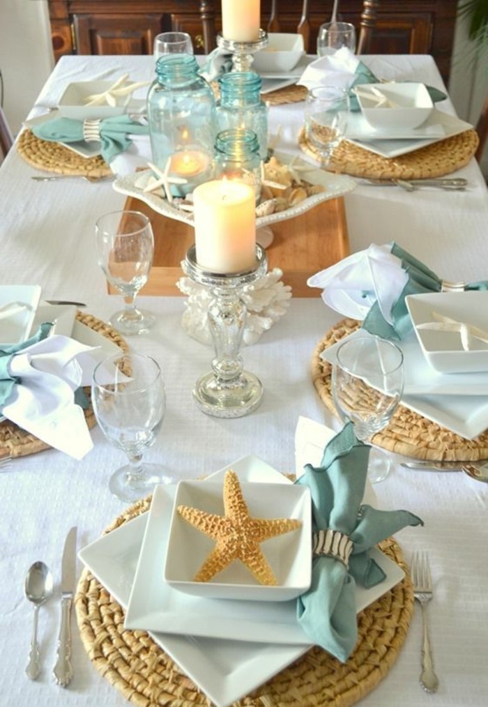 mesa de decoración marítima-con-estrellas de mar y velas