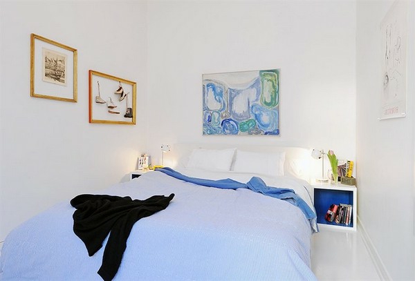 卧室设计，在斯堪的纳维亚风格的天蓝色的羽绒被许多图像篮