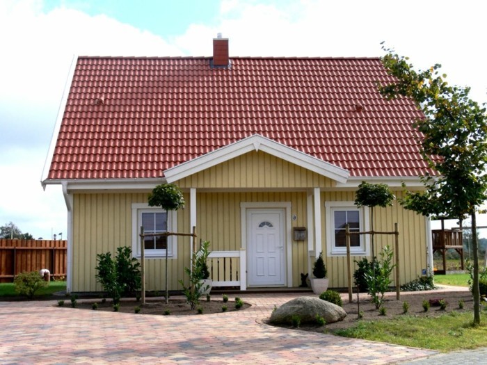 स्वीडन हाउस पीले घर-साथ-बरामदा