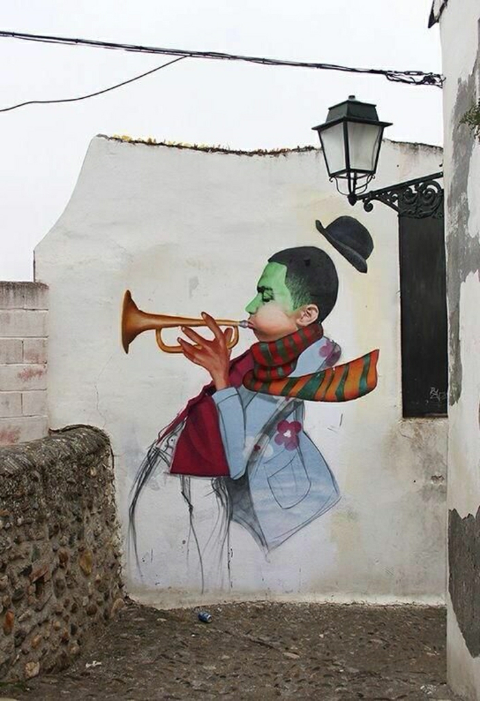 La pared de graffiti músicos de trompeta hat-arte