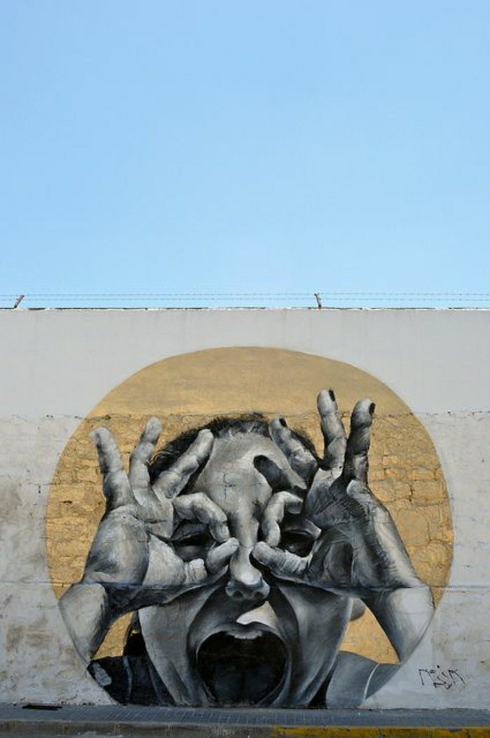Mur-Himmer yeux mains enfant Graffiti personnages drôles mesa Espagne