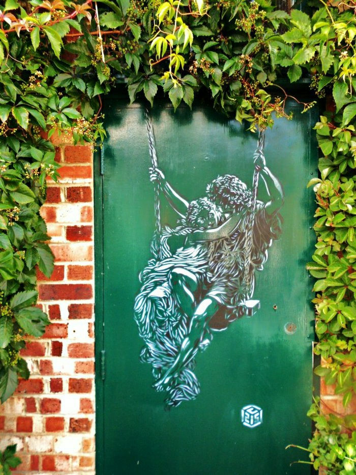 cuadro del arte dibujo de la pintada amantes puerta verde pared de ladrillo verde