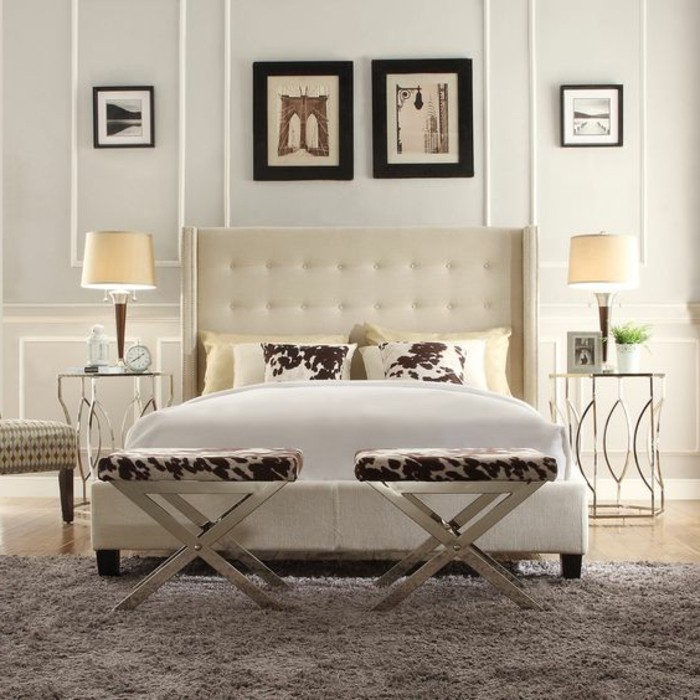 cuadro-por-cama tapizados-acogedor-ambiente-el-dormitorio con cama