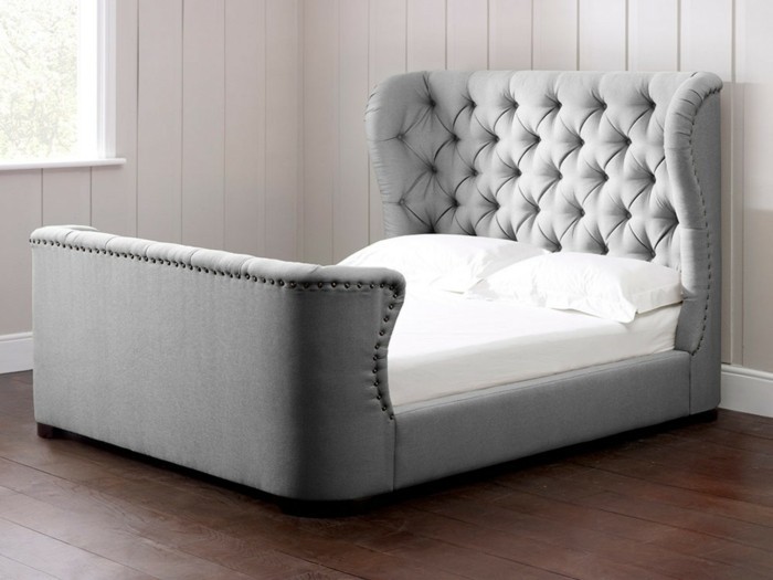 蓝色设计软垫床，有张床盒现代设计