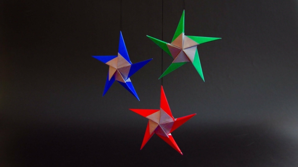 Värikäs origami-joulu tausta musta väri