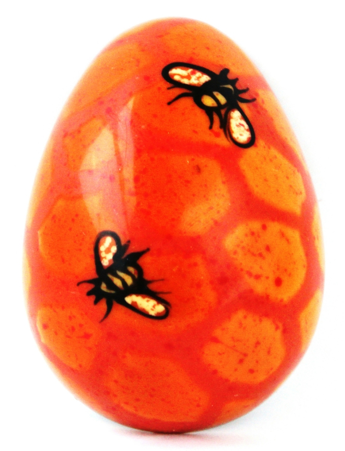 Oeufs de ruche et d'abeilles drôles de couleur orange avec motif géométrique