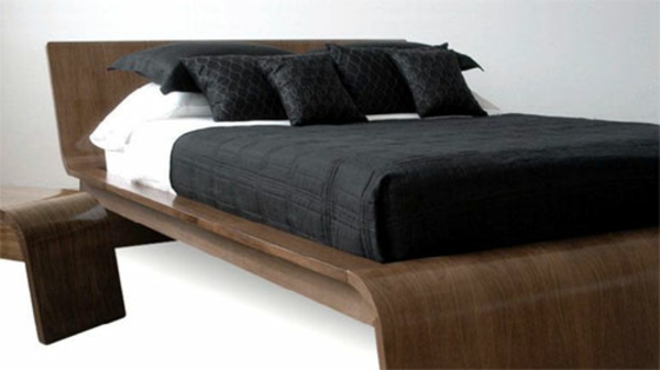 елегантно скандинавско легло с черно легло в бяло