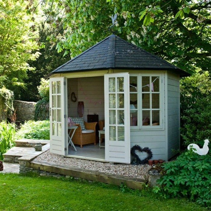 κήπος ιδέες-για-μικρά-κήπους-όμορφο εξοχικό σπίτι-με-ένα-μαύρο-οροφής