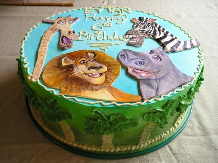 cumpleaños de la torta del papel pintado de león y-otros-animales