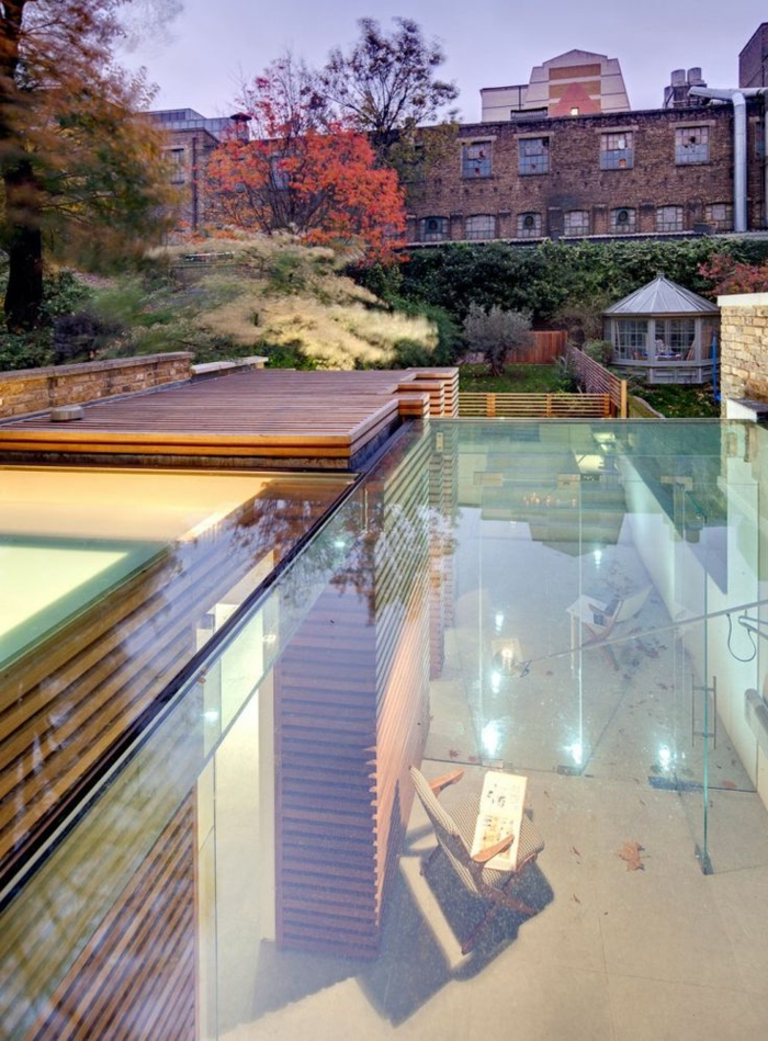 cristal de la pared-terraza-gran-piscina