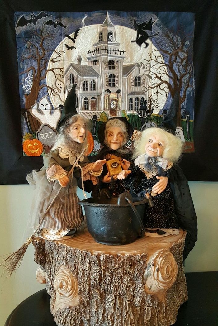 három boszorkány a bogrács körül dekoráció előtt egy kép a Halloween - képek a Halloween