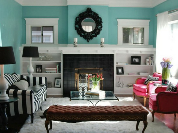 design à rayures lumineux couleur salon mur turquoise canapé en noir et blanc