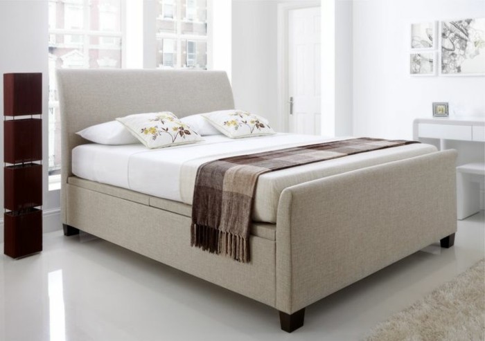 精彩的设计，的卧室软垫床，配有床箱