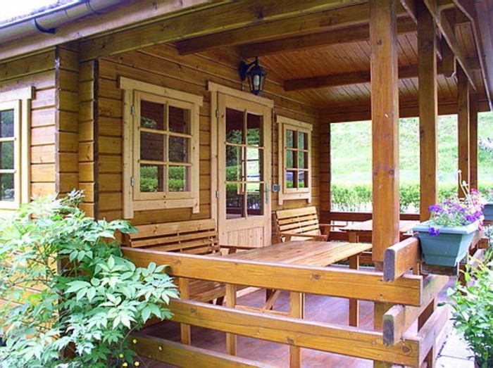 puu-house-with-veranta-pieni-Amerikan Hut