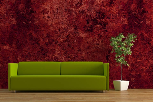 diseño de pared interesante-rojo oscuro- y un sofá en verde