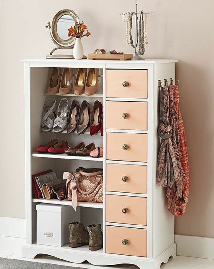 coqueta mueble-con-rosa-cajón de tres estantes de zapatos