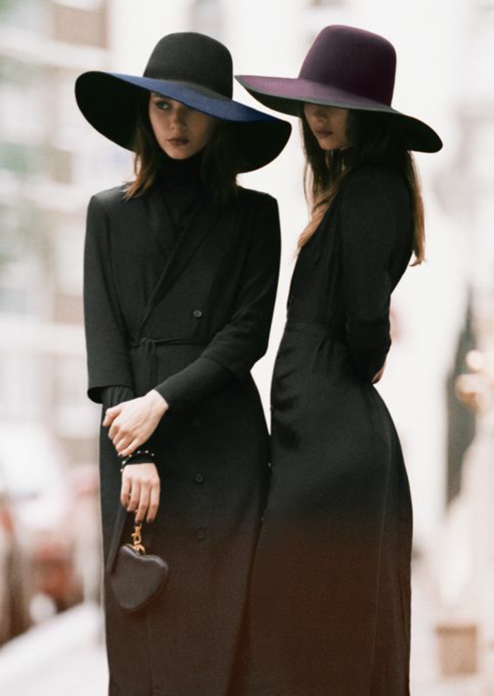 长大衣的女性时尚的黑色和高雅别致