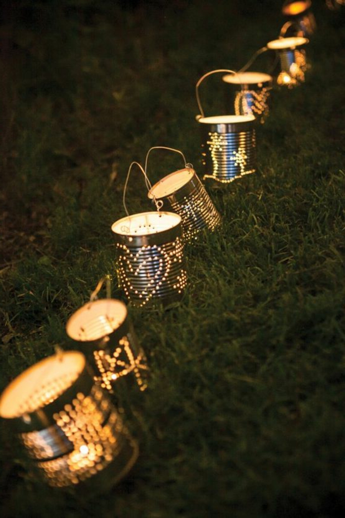 diy花园装饰，不同花纹罐头的风灯，草坪