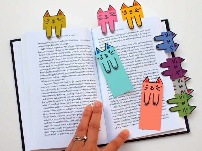 制作一本书 - 许多折纸人物带着有趣的外表