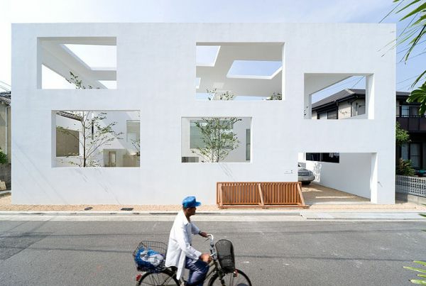 מודרני-רעיון-מינימליסטי-אדריכלות-אדם עם אופניים