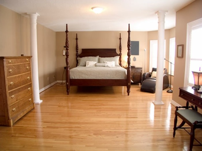 PVC plancher-belle-chambre-avec-un-lit confortable