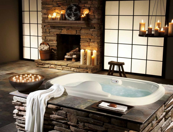 bain idée ameublement rustique salle de bains tabouret pierres cheminée serviettes bougie