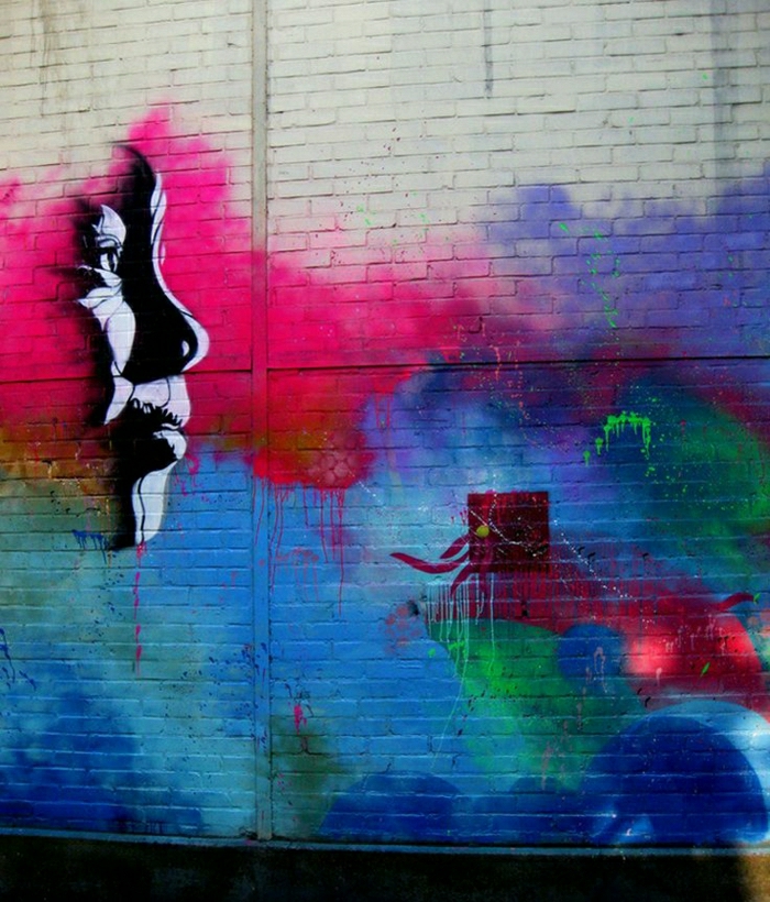 جميلة الكتابة على الجدران في الشوارع الفن وجها العديد من الألوان