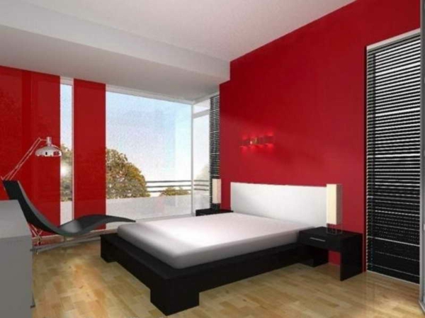 chambre à coucher avec un lit blanc et des murs rouges
