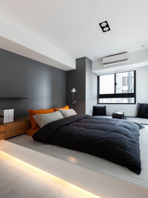 chambre-moderne-design gris-mur derrière le lit confortable