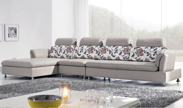 sohva-kansi-kulma-sohva-harmaa-väri-huone lasiseinillä