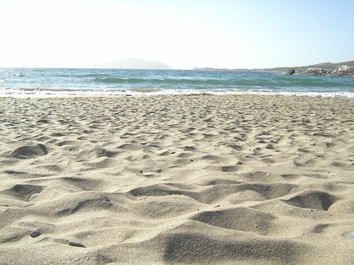 सूर्य और समुद्र तट रेत