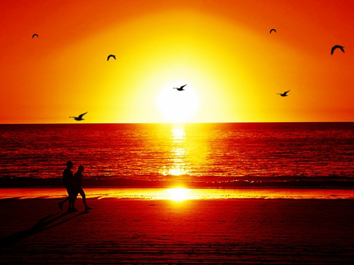 सूर्य और समुद्र तट सूर्यास्त-सुंदर-लुक
