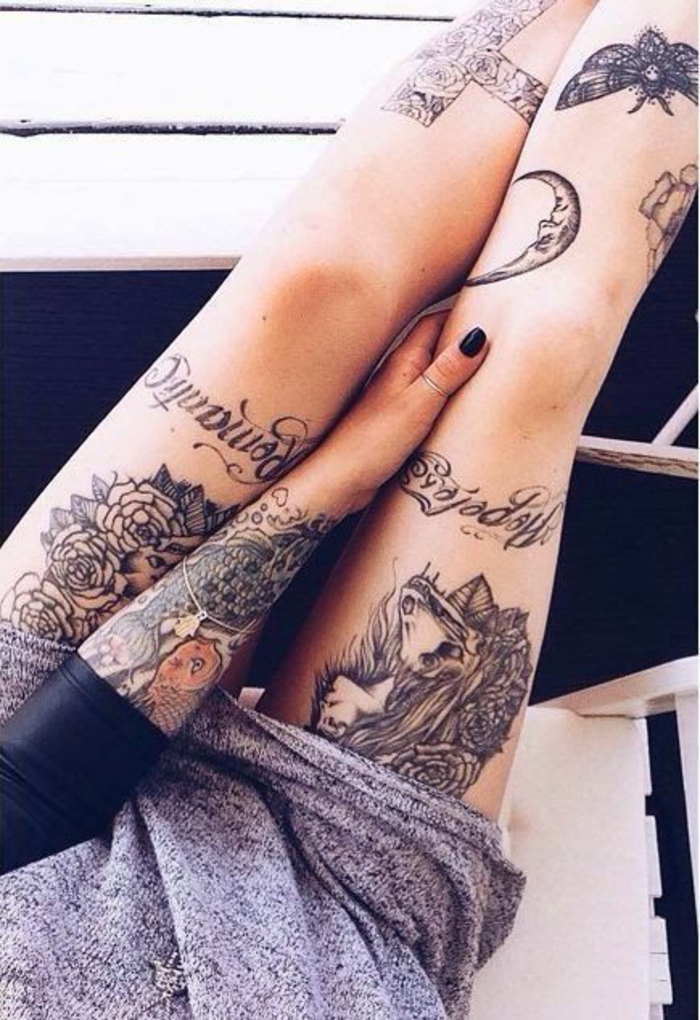 tatuajes de pierna, luna, mariposa, cruz, flores, motivos de tatuaje para mujeres