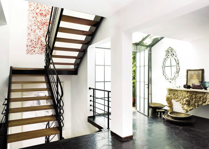 hacer dos escaleras con una gota de pintura roja entre las escaleras