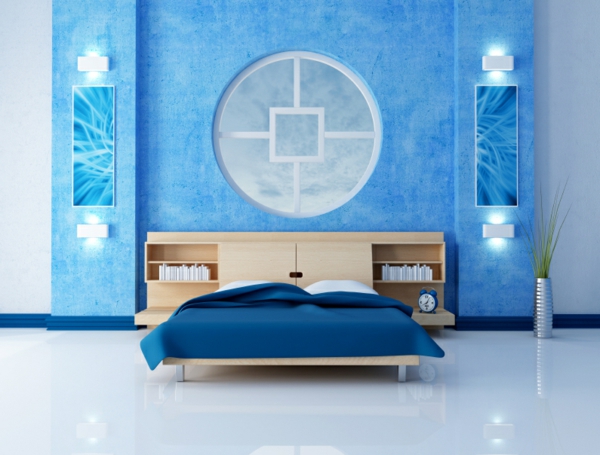 dormitorio azul con un círculo en la pared como decoración