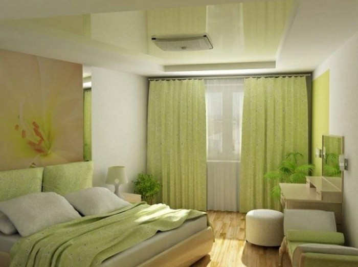 χρώμα του τοίχου πράσινο-ενδιαφέρουσα-ντουλάπα-μαξιλάρι-on-the-κρεβάτι-in-a-υπνοδωμάτιο