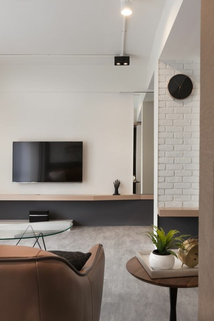 Olohuoneessa beige-moderni suunnittelu-tv-on-the-wall